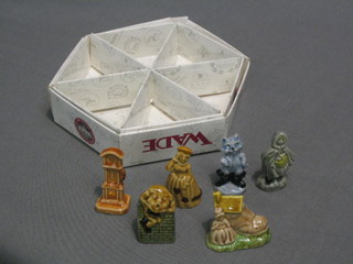 An octagonal Wade collector's box containing 6 Wade nursery rhyme figures