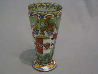 An 18th/19th Century Continental enamel waisted beaker with Knight's Armorial bearing, raised on a circular spreading base, 7"