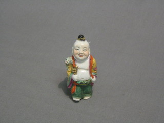 A 19th Century Oriental scent bottle in the form of a standing Buddha, the base with 4 character mark 3 1/2"