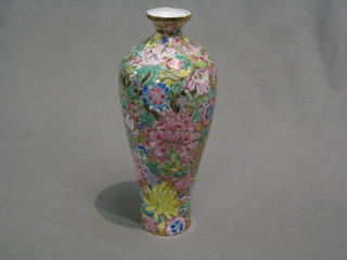 An Oriental enamelled vase 8"