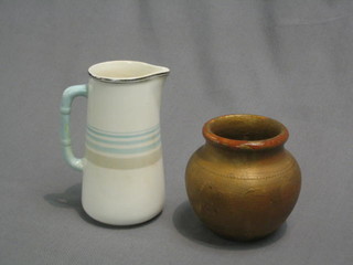An Art Deco Mintons pottery cream jug 5" with green banding and a gold painted Doulton vase 3"
