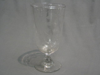 An etched glass trumpet shaped celery vase 9 1/2"
