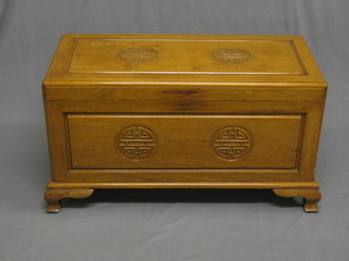 A 19th/20th Century Hong Kong camphor coffer with hinged lid, raised on ogee bracket feet 37"