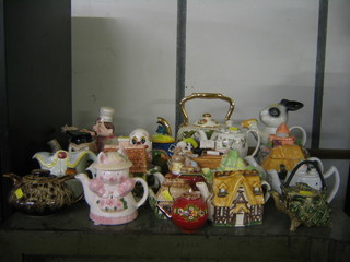 22 various decorative teapots