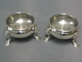 A pair of circular Georgian style silver salts, London 1923 5 ozs