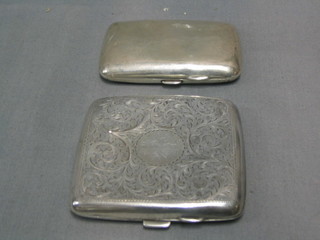 A plain silver cigarette case, Birmingham 1903 and an engraved silver cigarette case Birmingham 1922, 5 ozs