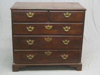 A Georgian mahogany chest with crossbanded top, fitted 2 short and 3 long drawers with brass swan neck drop handles, raised on bracket feet 40"