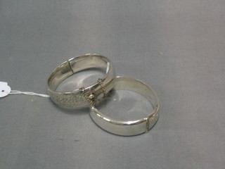 2 silver bracelets