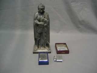 A table lighter in the form of a standing knight and 4 other lighters