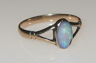 A gold ring set an opal