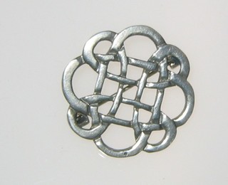 A silver Celtic knot brooch