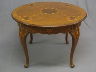 A 19th/early 20th Century circular Continental walnut centre table, inlaid throughout and raised on cabriole supports 38" (top scratched)