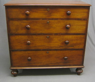 A Victorian D shaped mahogany chest of 4 long graduated drawers with brass escutcheons and tore handles, raised on bun feet 44"