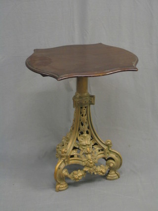A rectangular Victorian walnut occasional table raised on a pierced gilt painted iron base 22"