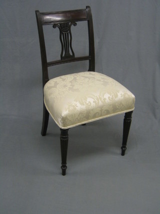 A 19th Century bar back dining chair with pierced mid rail and upholstered seat, raised on turned and reeded supports