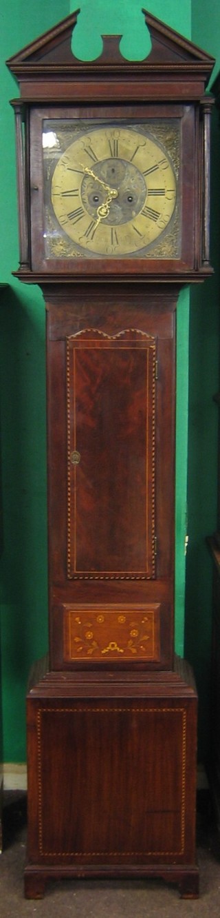 An 18th Century Irish longcase clock, the 13" square brass dial with gilt metal spandrels and minute indicator (f) by David Gordon of Dublin, striking on a bell and contained in an inlaid mahogany case with broken pediment, raised on bracket feet, 88"