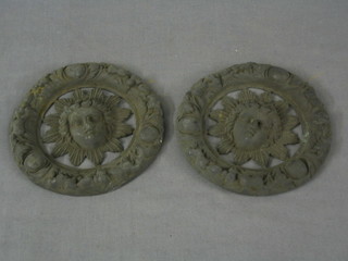A pair of 19th Century circular pierced heavy cast metal door embellishments, decorated sunburst heads 6"