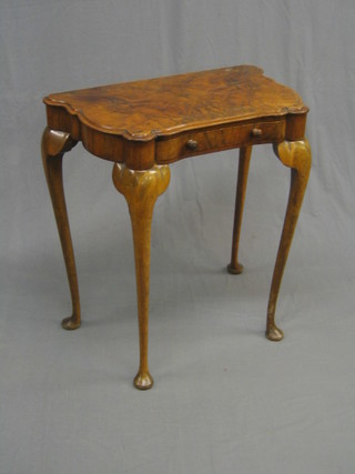 A 1930's figured walnut side table, fitted a frieze drawer and raised on cabriole supports 28" (missing top and having 6 holes to the top - filled)