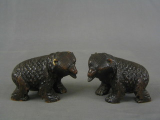 A pair of carved figures of bears 6" (ears f)