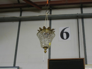 A waisted cut glass and gilt metal hanging light shade