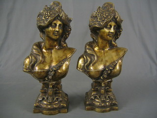 A pair of 20th Century Art Nouveau style bronze head and shoulders portrait busts of ladies 22"