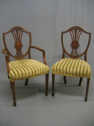 A set of 8 20th Century Hepplewhite style shield back dining chairs (2 carvers, 6 standard) with upholstered seats, raised on reeded supports ending in spade feet