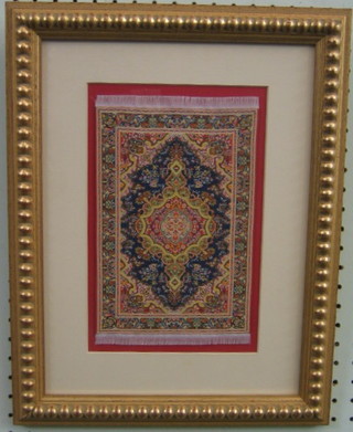 A fine quality small framed silk panel in the form of a Persian rug 9" x 6"