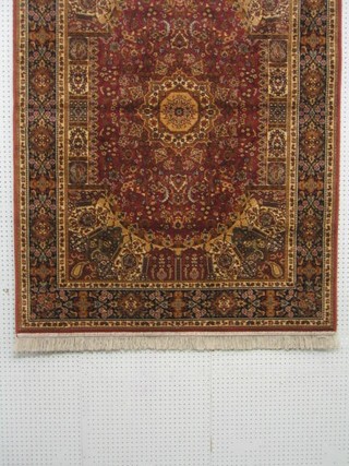 A pink ground Persian design Belgian cotton rug 67" x 49"