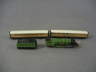 A Horny O gauge locomotive The Flying Scotsman and 2 Hornby LNER carriages, unboxed