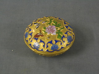 A circular 20th Century champ leve enamelled jar and cover with floral decoration 3 1/2"