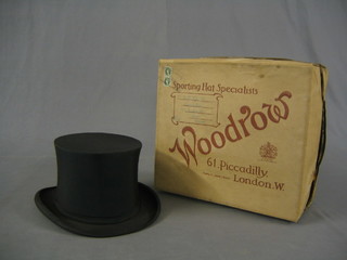A Gentleman's black folding opera hat by Lincoln Bennett & Co, approx. size 7 1/4