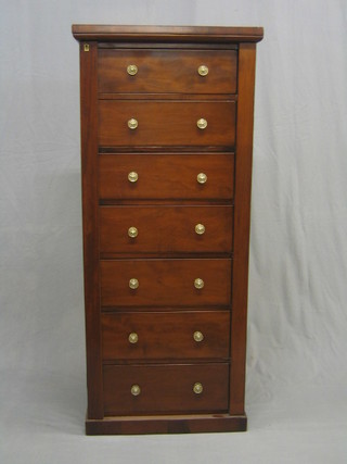 A Victorian mahogany Wellington chest of 7 drawers (badly polished and with replacement handles) 22"