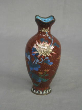 A 19th/20th Century cloisonne enamelled baluster shaped vase with rust ground and floral decoration 7 1/2"