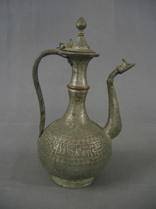 A circular Eastern engraved metal coffee pot with hinged lid 14