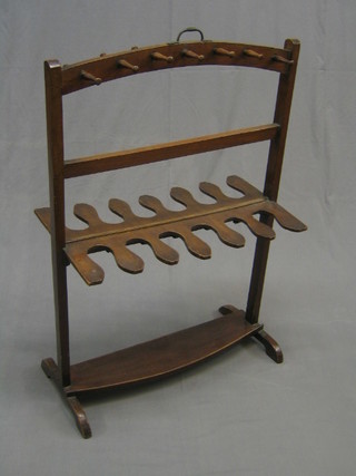 A 19th Century mahogany whip and boot stand  (1 bobbin missing)