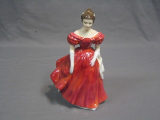 A Royal Doulton figure, Winsome, HN2220 (cracked)