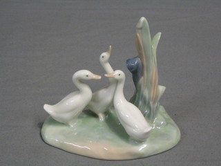 A Nao figure of a geese in reeds, the base marked Nao and impressed 0006, 4"