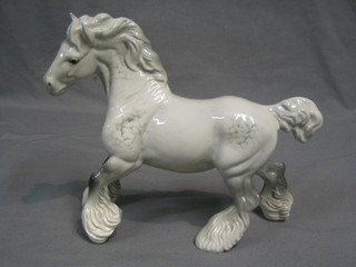 A Beswick figure of a cantering grey Shire Horse, gloss finish, model no. 975, 8"
