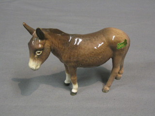 A Beswick figure of a grey standing donkey, gloss finish, model no. 1364B 5"