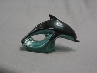 A Poole Pottery figure of a diving dolphin 7"