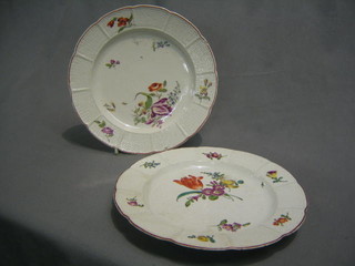 A pair of 18th Century Ludwigs? bird plates with floral decoration 10"