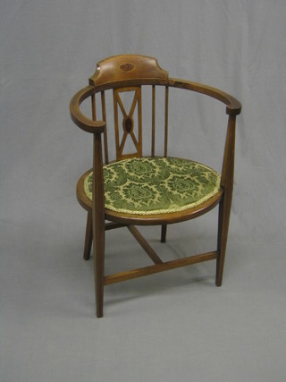 An Edwardian inlaid mahogany tub back bedroom chair with upholstered seat, raised on square supports united by an H framed stretcher (old and visible break to the back)