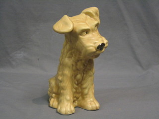 A cream glazed Sylvac figure of a seated dog, base marked Sylvac 1380 10"