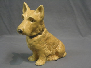 A Sylvac figure of a seated dog, RD  no. 778504 marked 1209 Sylvac 10"