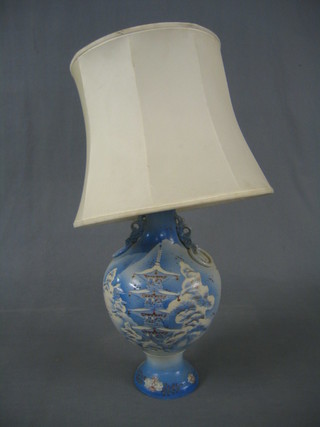 A 1930's Oriental blue glazed pottery twin handled vase raised on a circular base 17", converted to a table lamp (chip to base)