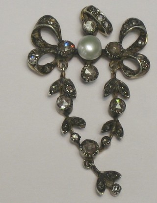 A lady's Victorian style pearl and diamond set drop pendant