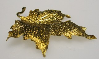 A Continental 18ct gold leaf shaped brooch