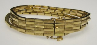 An 18ct gold 6 strand multiple link bracelet