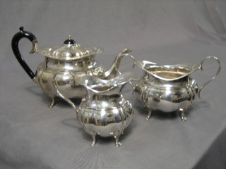 An oval silver plated 3 piece tea service with teapot, twin handled sugar bowl and cream jug