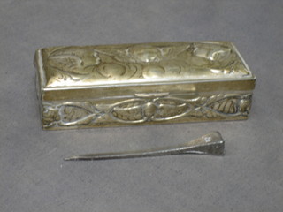 A rectangular embossed silver trinket box with hinged lid decorated angels 4"